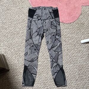 Lululemon Stylish Black and Gray Leggings with mesh
